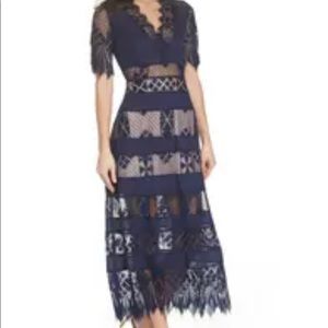 Navy sheer lace tea length dress